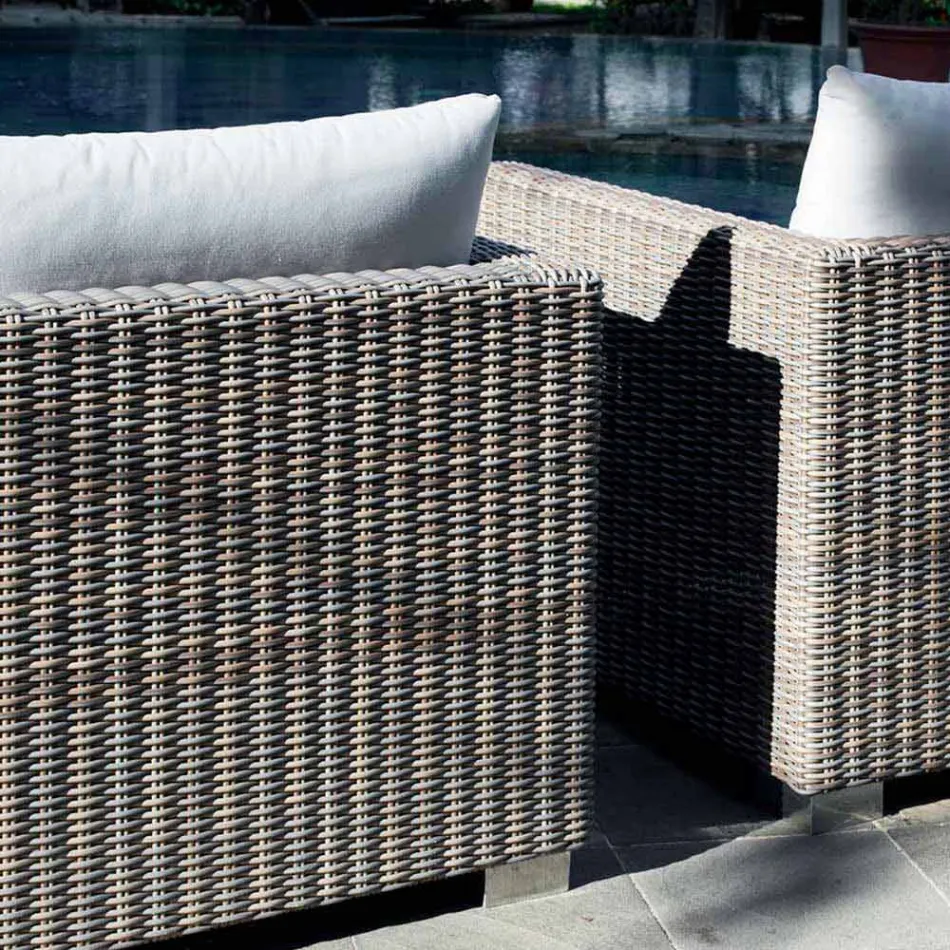 Outdoor seating composition with hand-woven structure Rita Viadurini