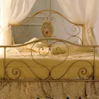 Double bed with coordinated tubular iron footboard Made in Italy - Chic Viadurini