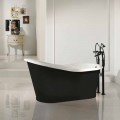 Freestanding bathtub in old vintage painted cast iron